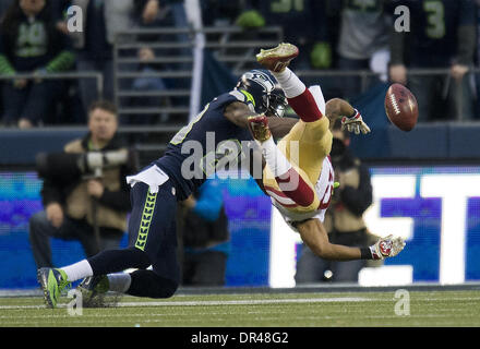 Seattle, WA, USA. 19 Jan, 2014. San Francisco 49ers d'utiliser de nouveau LaMichael James (23) après la balle fumbles touchés par Seattle Seahawks wide receiver Ricardo Lockette (83) et est récupérée par San Francisco 49ers arrière défensif Darryl Morris (40) au deuxième trimestre au cours de la NFC championnat match entre les San Francisco 49ers et les Seahawks de Seattle au champ CenturyLink à Seattle, Washington le Dimanche, Janvier 19, 2014. Crédit : Paul Kitagaki Jr/Sacramento Bee/ZUMAPRESS.com/Alamy Live News Banque D'Images