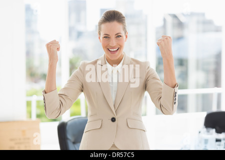 Cheerful businesswoman work in office Banque D'Images