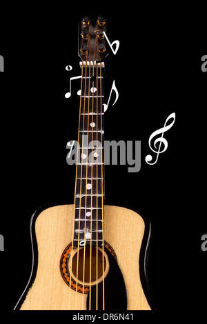 Guitare acoustique avec les notes de musique Banque D'Images