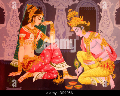 Peinture murale indienne de dieu indien Krishna et radha dans une scène romantique Banque D'Images