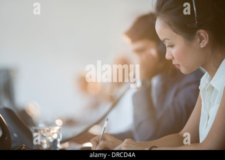 Business people working in office Banque D'Images