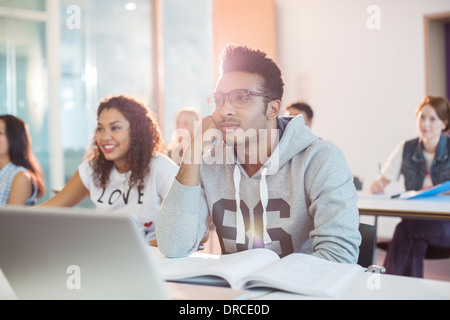 University students sitting in classroom Banque D'Images