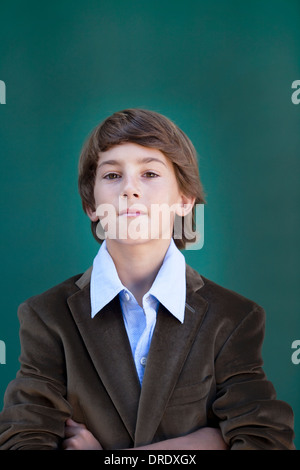 Jeune garçon dans l'Élégant blazer Banque D'Images