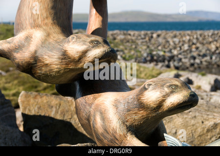 La sculpture à la loutre d'un terminal de ferries à Ardmor Mhòr (Aird), l'île de Barra, îles Hébrides, Ecosse, Royaume-Uni Banque D'Images