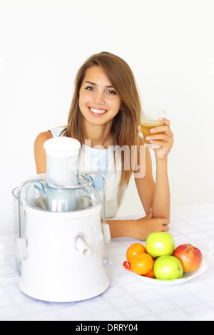 Happy girl sur juicers Banque D'Images