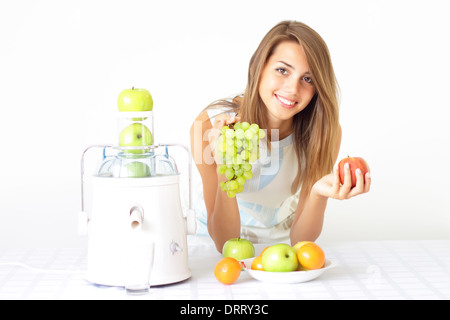 Happy girl sur juicers Banque D'Images