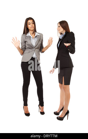 Portrait of two businesswomen having an argument isolé sur fond blanc Banque D'Images