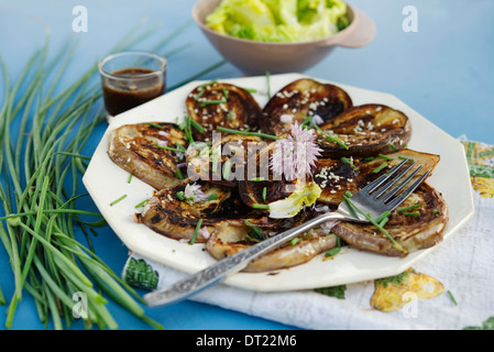 Aubergines grillées sauce miso Banque D'Images