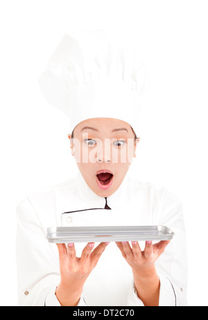 Femme asiatique incroyable chef holding tray Banque D'Images