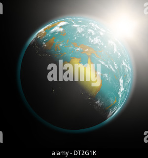 Vue de l'espace du soleil se levant sur l'Australie sur la planète Terre. Éléments de cette image fournie par la NASA. Banque D'Images