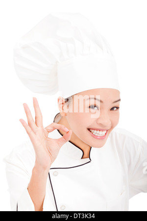 Happy asian woman chef showing ok hand sign Banque D'Images