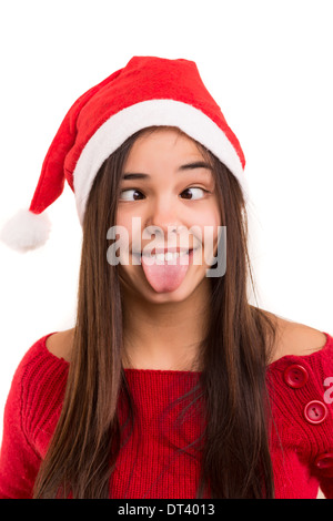 Une belle femme asiatique avec un chapeau de noël faire une expression idiote Banque D'Images