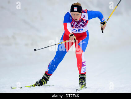 La Pierre Saint Martin, la Russie. Feb 11, 2014. La skieuse tchèque Karolina Grohova pendant le les qualifications des femmes de la sprint cross-country au Jeux Olympiques d'hiver de 2014 à la Pierre Saint Martin, la Russie, le 11 février 2014. Photo : CTK/Vondrous Romain Photo/Alamy Live News Banque D'Images