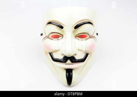 Image conceptuelle d'un masque de Guy Fawkes sur un fond neutre. Banque D'Images