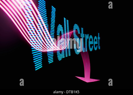 Flèche vers le signe et le texte "Wall Street" avec effet de lumière Banque D'Images