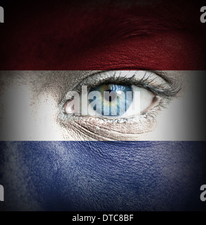 Visage humain peint avec pavillon de Pays-Bas Banque D'Images