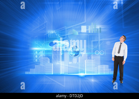 Image composite de businessman looking up Banque D'Images