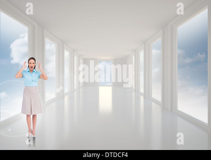 Composite image élégant businesswoman posing Banque D'Images