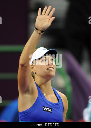 Doha, Qatar. Feb 15, 2014. Angelique Kerber de l'Allemagne célèbre après le match de la femme contre Jelena Jankovic de la Serbie lors de l'Open de tennis du Qatar à Doha, Qatar, le 15 février 2014. Jankovic a perdu 0-2. Crédit : Chen Shaojin/Xinhua/Alamy Live News Banque D'Images