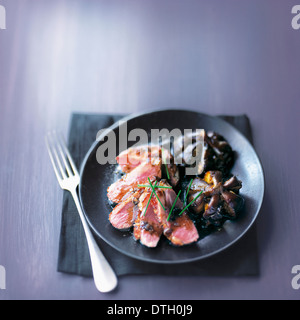 Magret de canard aux moules Banque D'Images