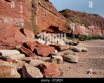 Les roches rouges du Trias sur la côte jurassique inférieur à Orcombe Point, Exmouth, Devon, UK Banque D'Images