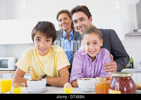 Happy Family having breakfast together Banque D'Images