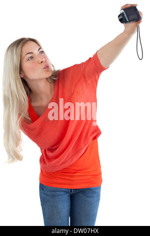 Femme faisant un baiser à l'appareil photo Banque D'Images
