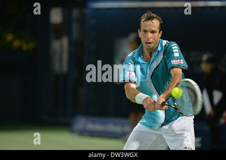 Dubaï, Émirats arabes unis, le 26 mars 2014. Radek Stepanek joue un coup en revers contre Roger Federer au 2ème tour du Dubai Duty Free Tennis Championships. Federer a gagné 6-2 6-7 6-3 à l'avance pour les quarts de finale du tournoi Crédit : Feroz Khan/Alamy Live News Banque D'Images