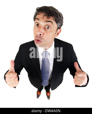 High angle portrait en perte de vue d'un homme motivé donnant un coup de double geste d'approbation et le succès Banque D'Images