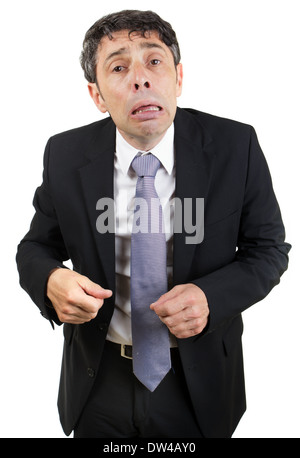 Chagrin et businessman crying debout regardant la caméra avec une pitoyable affliction de l'expression , isolated on white Banque D'Images