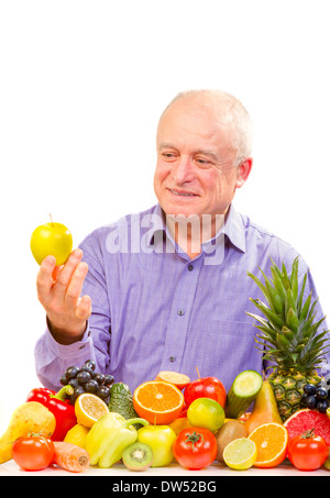 Closeup of senior man holding apple Banque D'Images