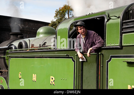 Un conducteur de train à vapeur 1940 week-end Banque D'Images