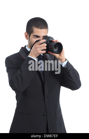 Photographe professionnel la photographie avec un appareil photo reflex numérique isolé sur fond blanc Banque D'Images