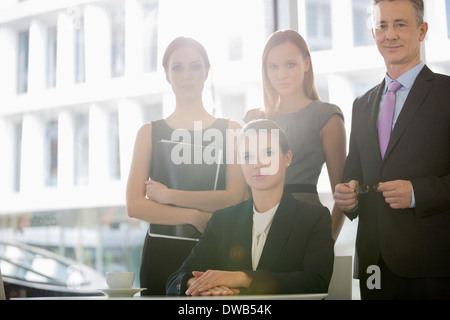 Portrait of business people in office cafeteria Banque D'Images