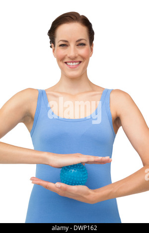 Portrait of a young woman holding contenu anti-stress Banque D'Images