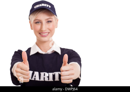 Close up portrait of female volunteer with Thumbs up on white background Banque D'Images