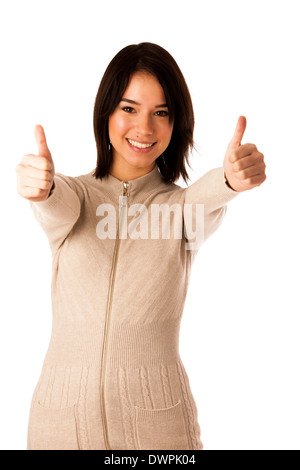 Beautiful young asian woman in sweater showing thumb up isolé sur fond blanc Banque D'Images