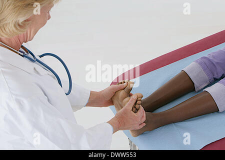 Femme à l'Auscultation Banque D'Images