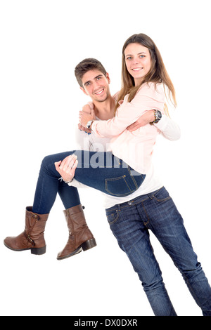 Young man carrying girlfriend isolés dans White Banque D'Images