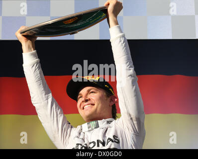 Le vainqueur de l'épreuve Nico Rosberg (GER) # 6, Mercedes AMG Petronas F1 Team célèbre sur le podium du Championnat du Monde de Formule1 2014 - Round 01 à Melbourne Albert Park, Melbourne, Australie, le dimanche 16 mars 2014 Banque D'Images