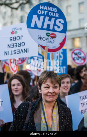 London, UK . Mar 19, 2014. Une journée de protestation contre les coupes budgétaires et d'austérité est pris en charge par Caroline Lucas (photo), le Parti Vert, John McInally - vice-président national de l'Union européenne, les PC CND et divers organismes étudiants. Dans le même temps, une pétition est remis à Downing Street. En face de Downing Street, à Whitehall, Londres, Royaume-Uni 19 mars 2014. Crédit : Guy Bell/Alamy Live News Banque D'Images
