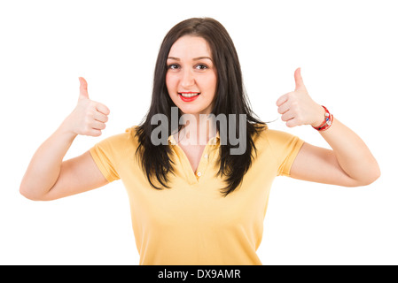 Happy woman in blank yellow t-shirt giving thumbs isolé sur fond blanc Banque D'Images