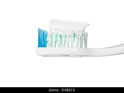 Brosse à dents avec coller sur le fond isolé Banque D'Images