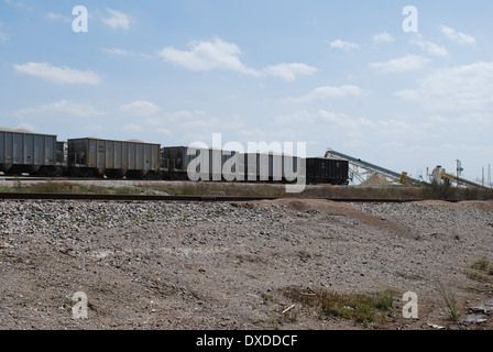 Texas Industries pour fusionner avec Martin Marietta Corporation au deuxième trimestre 2014. La TXI wagons sont chargés ici. Banque D'Images