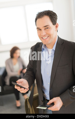 Businessman at airport Banque D'Images