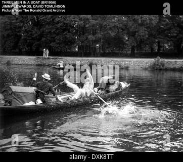 Trois HOMMES DANS UN BATEAU Banque D'Images