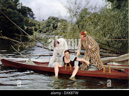 Trois HOMMES DANS UN BATEAU Banque D'Images