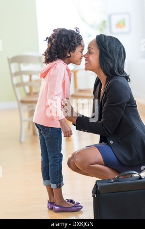 Black mother and daughter rubbing noses Banque D'Images