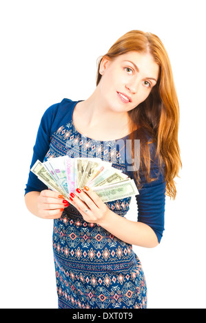 Beautiful smiling woman holding un ventilateur d'argent Banque D'Images