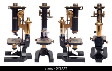 Quatre vues d'un laiton antique microscope pétrologique par R. Fuess de Berlin, Allemagne, cut-out fond blanc Banque D'Images